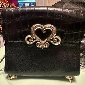 Vintage Brighton in excellent condition. Unique hardware and feet.